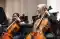 Sarasota Orchestra Principal Cello Natalie Helm plays alongside an SYO student